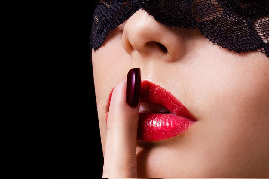 Woman show finger on lips - silence